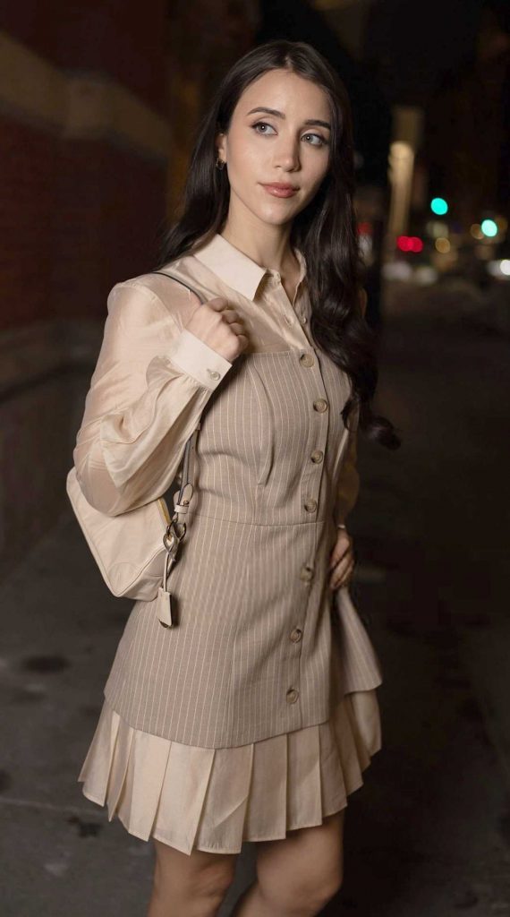 Caylee Cowan in a Beige Dress