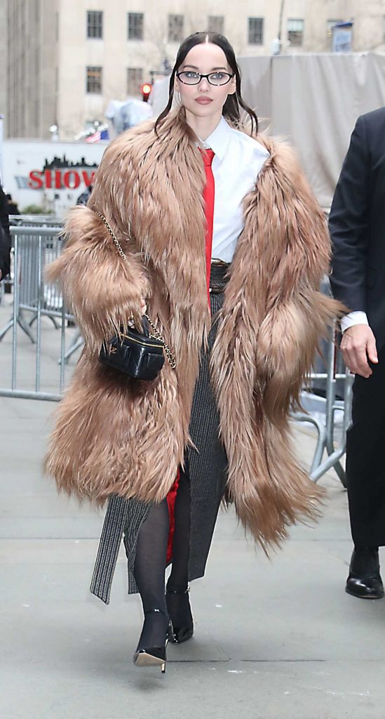 Dove Cameron in a Beige Fur Coat