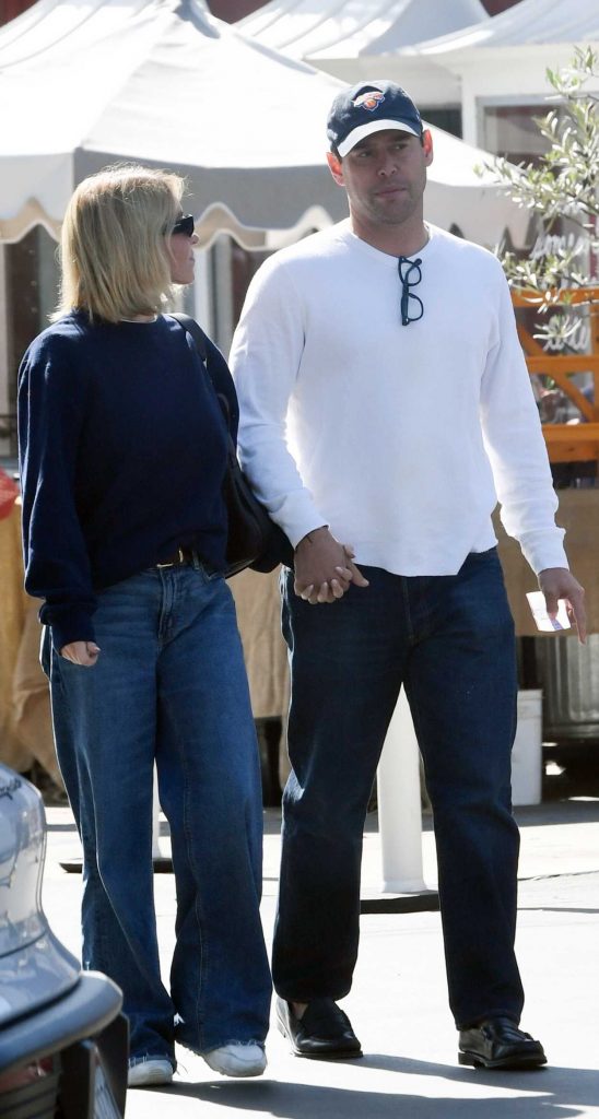 Sydney Sweeney in a Navy Sweatshirt