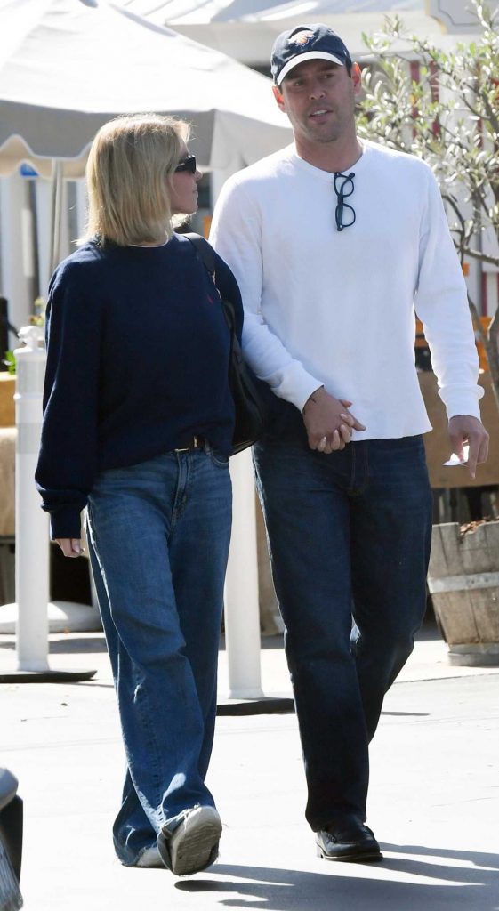 Sydney Sweeney in a Navy Sweatshirt