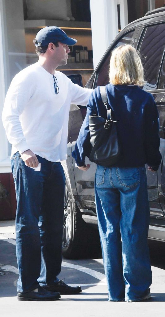 Sydney Sweeney in a Navy Sweatshirt