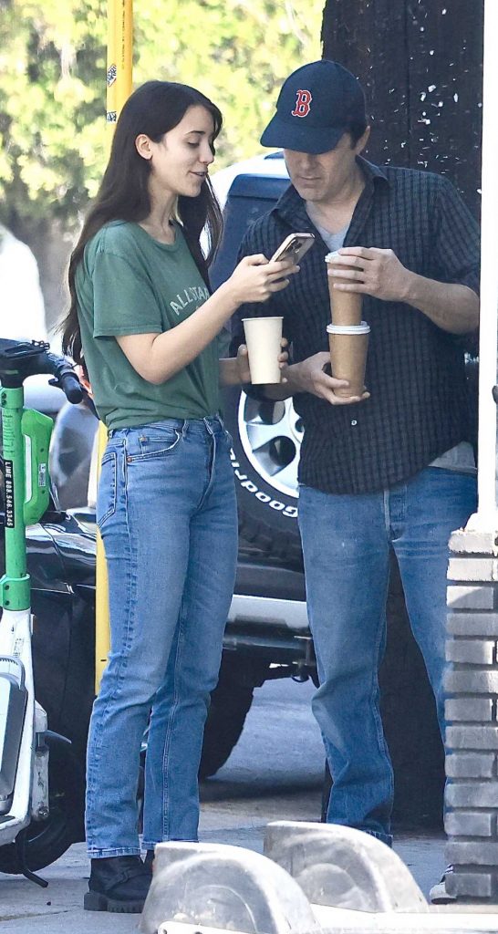 Caylee Cowan in a Green Tee