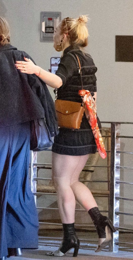 Florence Pugh in a Black Mini Dress