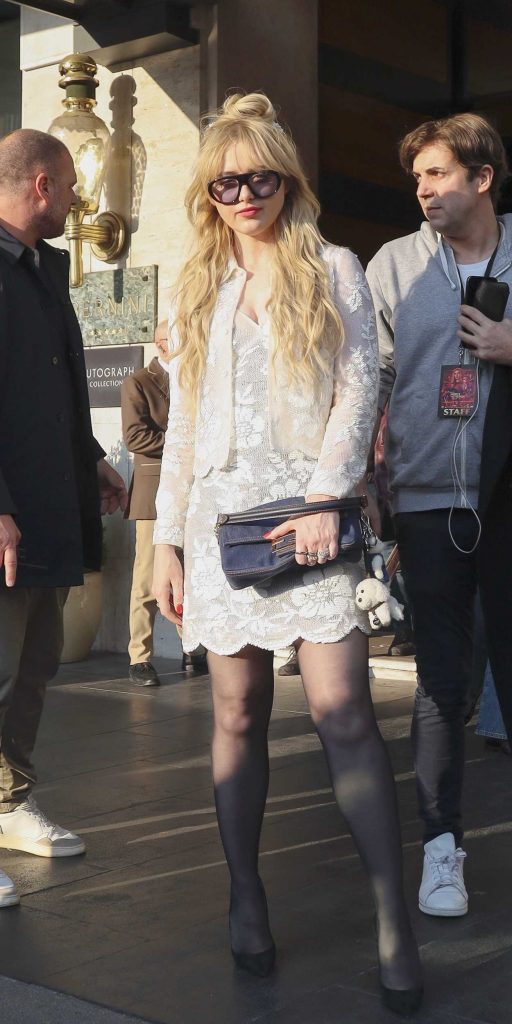 Kathryn Newton in a White Lace Ensemble