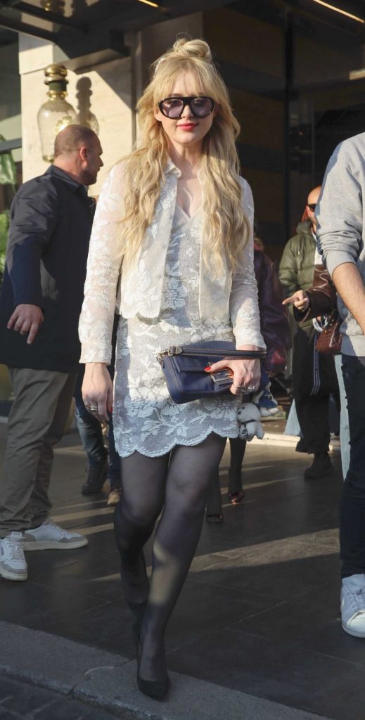 Kathryn Newton in a White Lace Ensemble