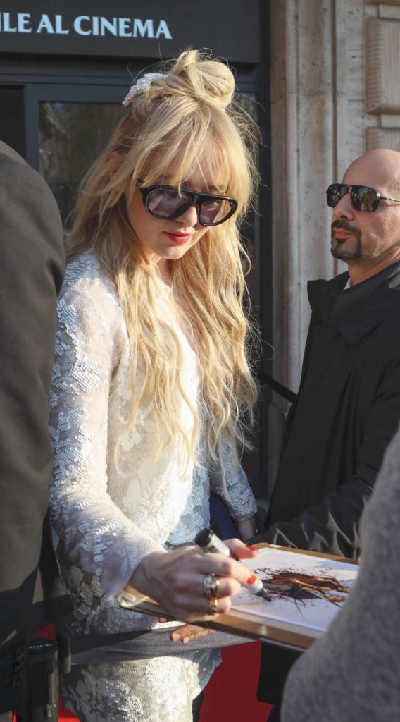 Kathryn Newton in a White Lace Ensemble