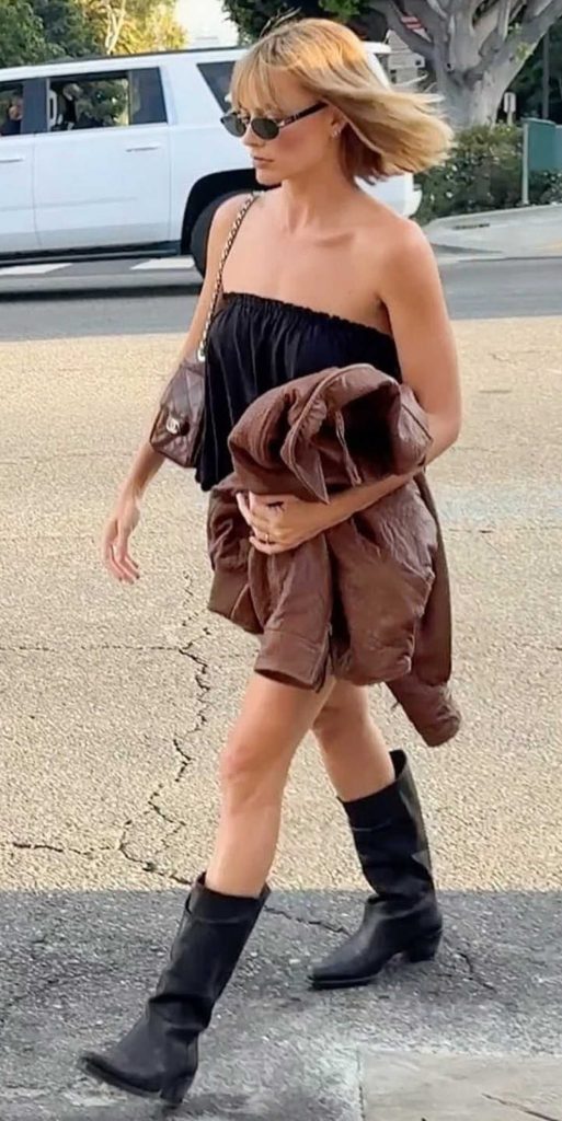 Margot Robbie in a Black Knee-Length Boots
