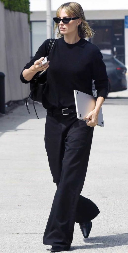 Margot Robbie in a Black Outfit