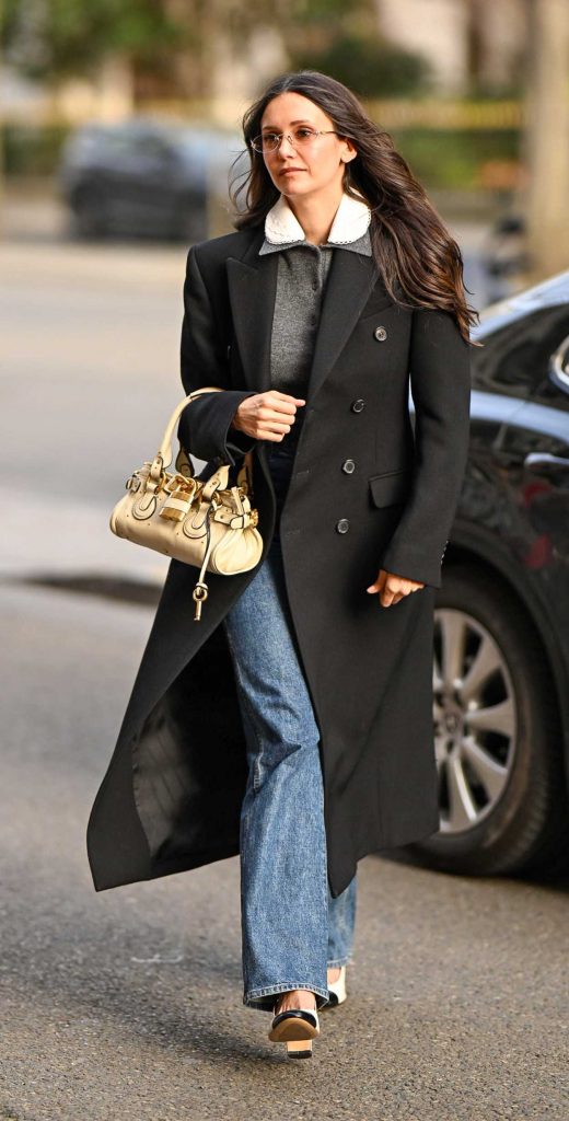 Nina Dobrev in a Black Coat