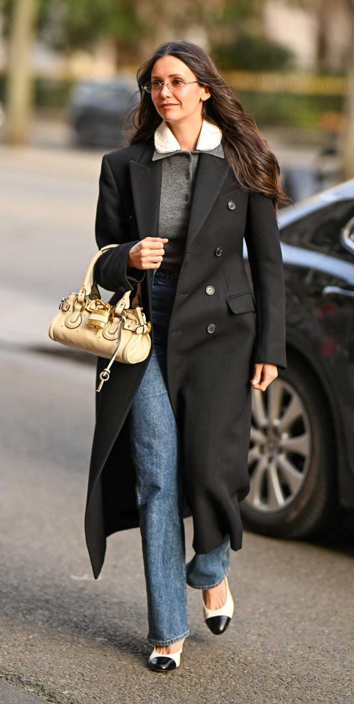 Nina Dobrev in a Black Coat