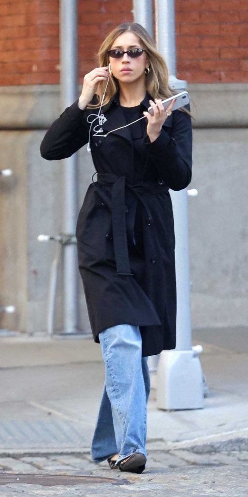 Tate McRae in a Black Trench Coat