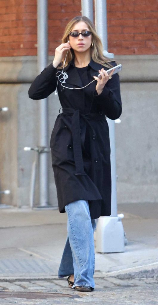 Tate McRae in a Black Trench Coat