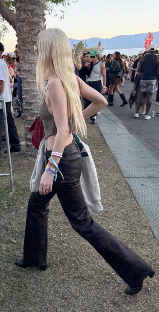 Anya Taylor-Joy in a Tan Knitted Top