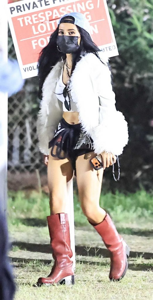 Becky G in a Black Protective Mask