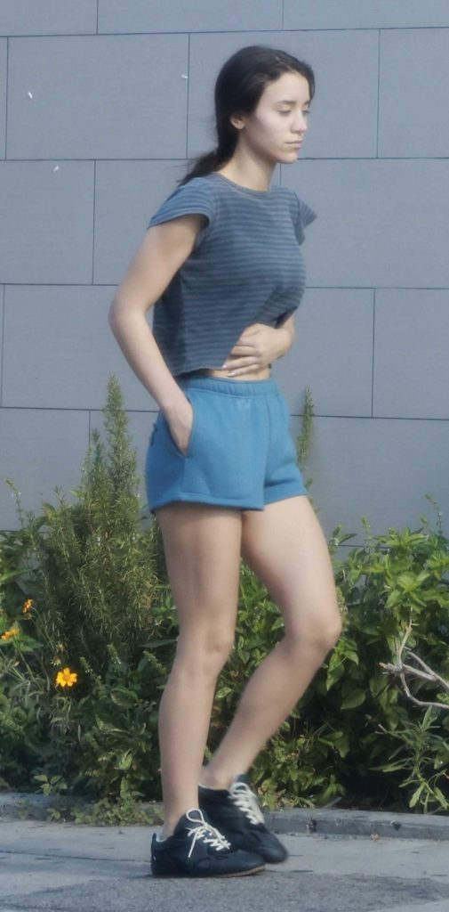 Caylee Cowan in a Blue Shorts