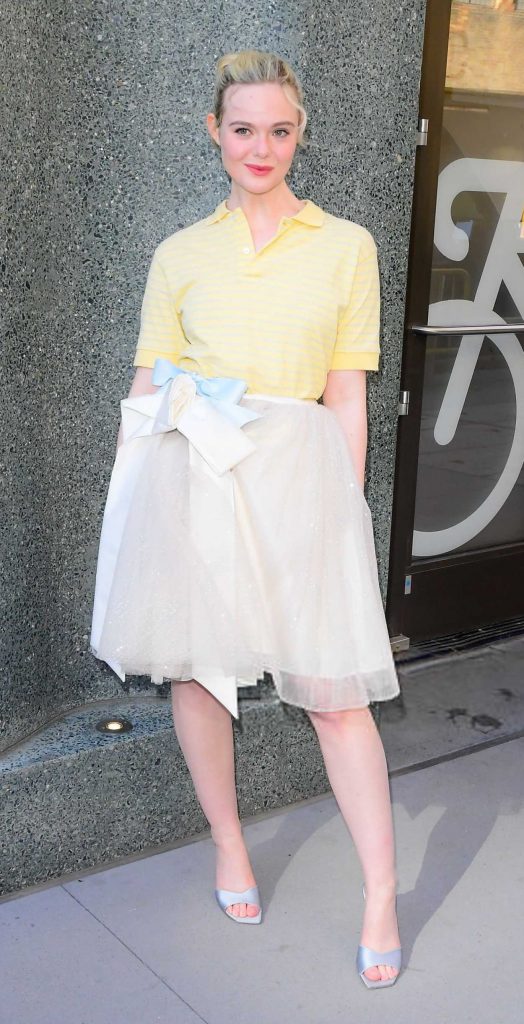 Elle Fanning in a Yellow Polo