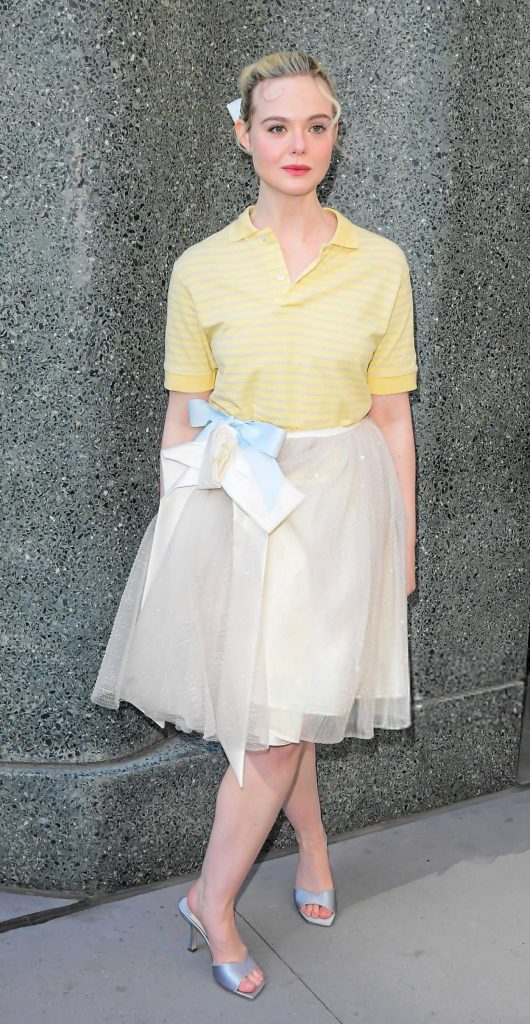 Elle Fanning in a Yellow Polo
