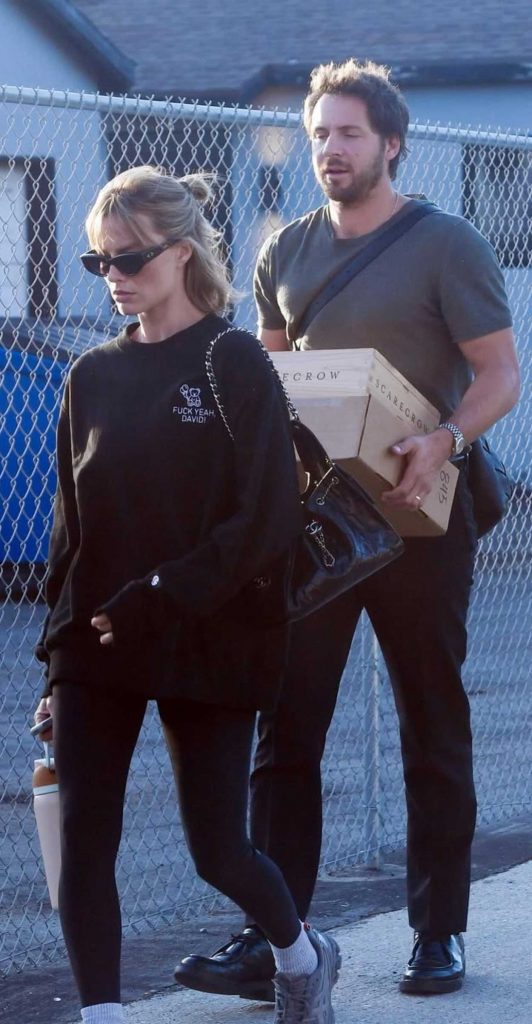 Margot Robbie in a Black Sweatshirt