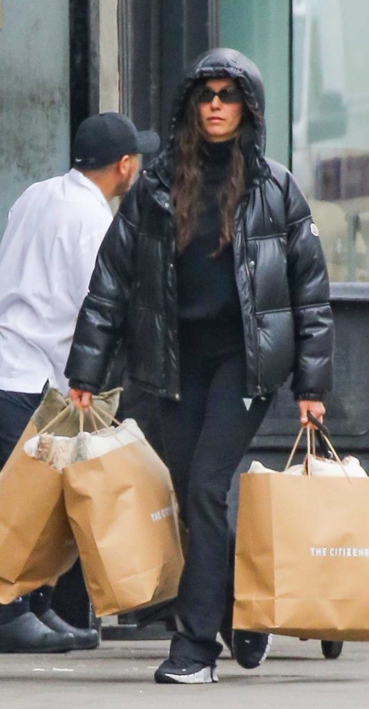 Nina Dobrev in a Black Puffer Jacket