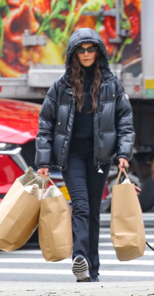 Nina Dobrev in a Black Puffer Jacket