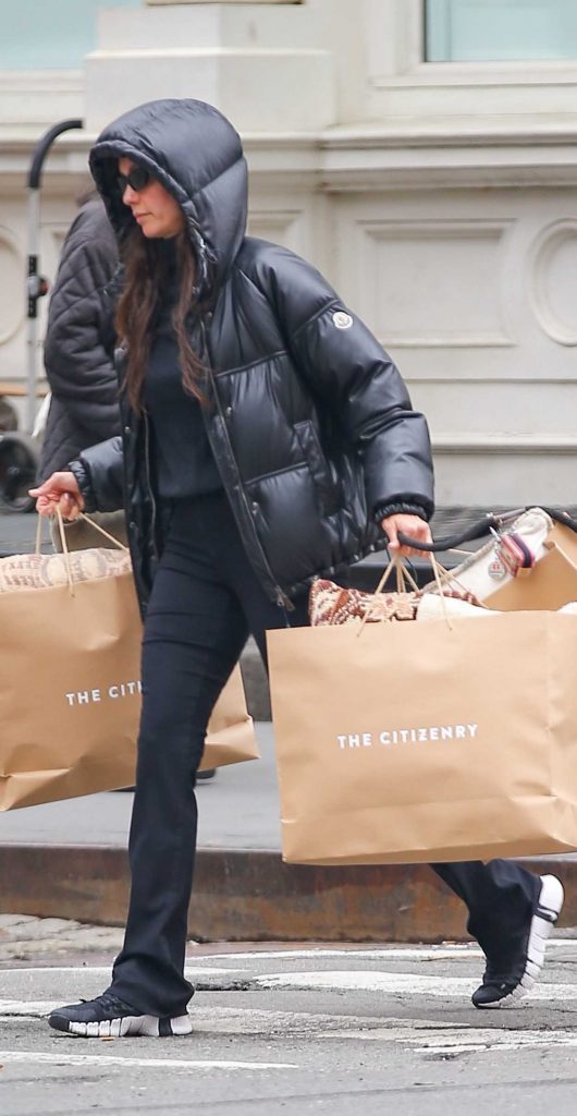 Nina Dobrev in a Black Puffer Jacket