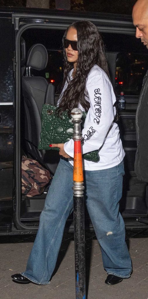 Rihanna in a White Long Sleeves T-Shirt