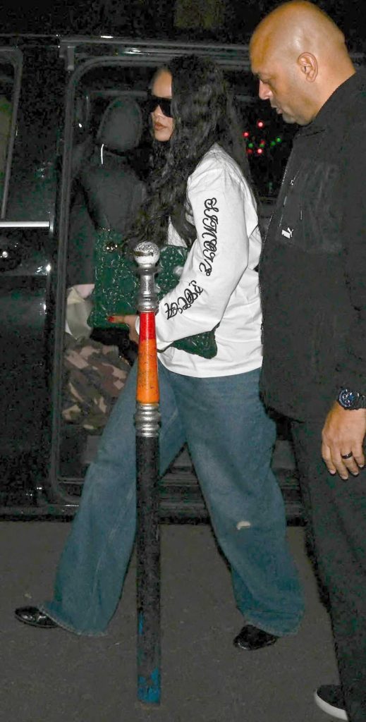 Rihanna in a White Long Sleeves T-Shirt