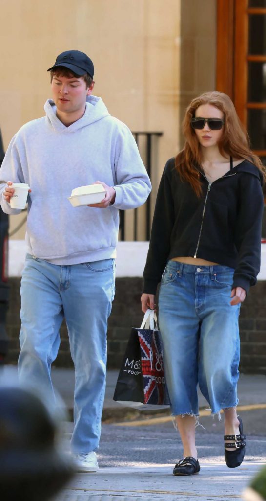 Sadie Sink in a Black Track Jacket