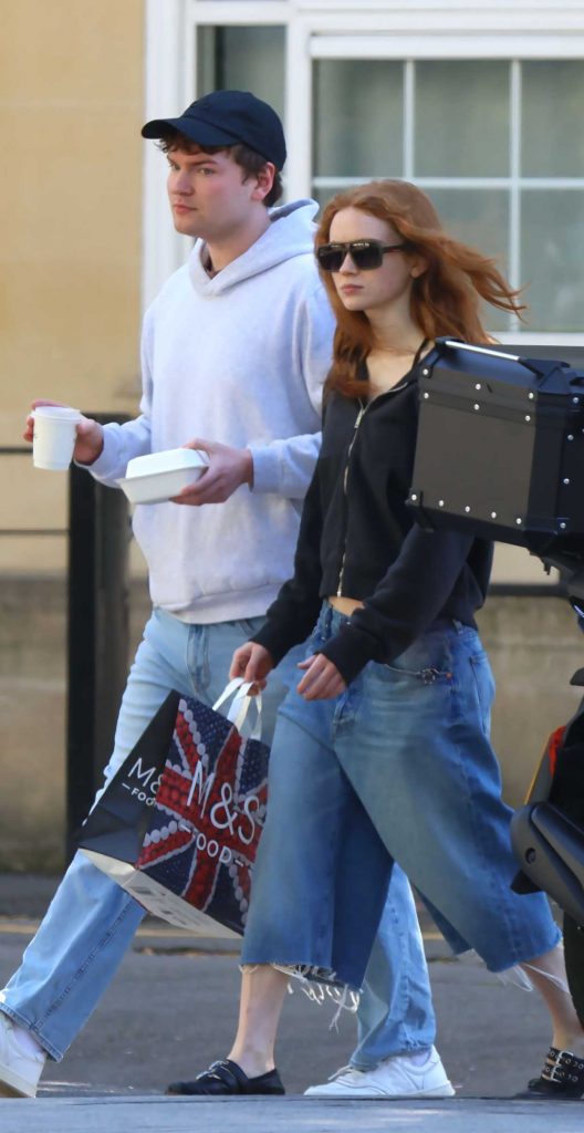 Sadie Sink in a Black Track Jacket