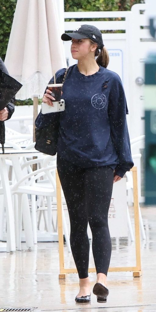 Tate McRae in a Black Cap