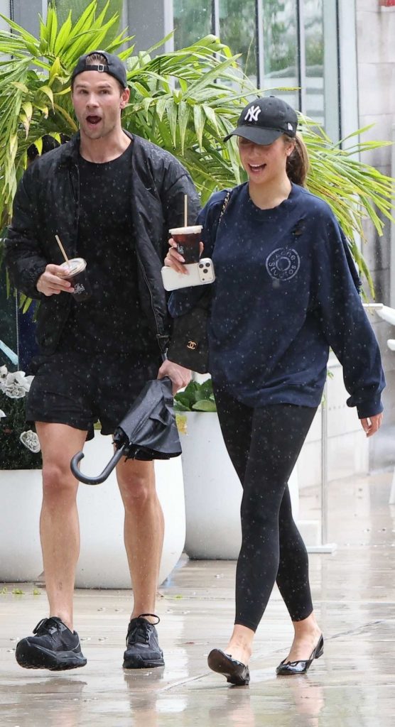 Tate McRae in a Black Cap