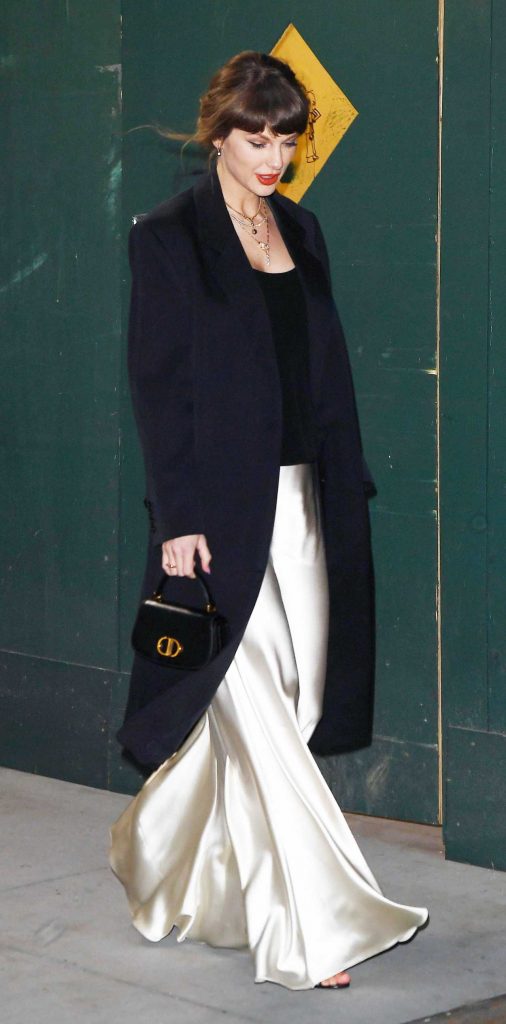 Taylor Swift in a Beige Skirt