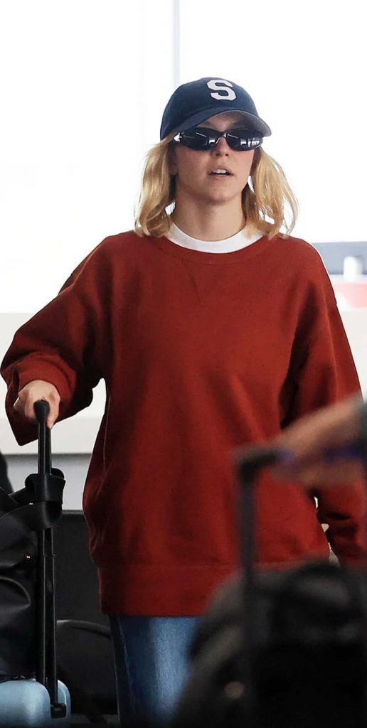 Sydney Sweeney in a Black Cap