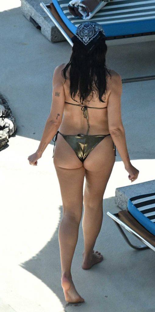Dua Lipa in a Gold Bikini