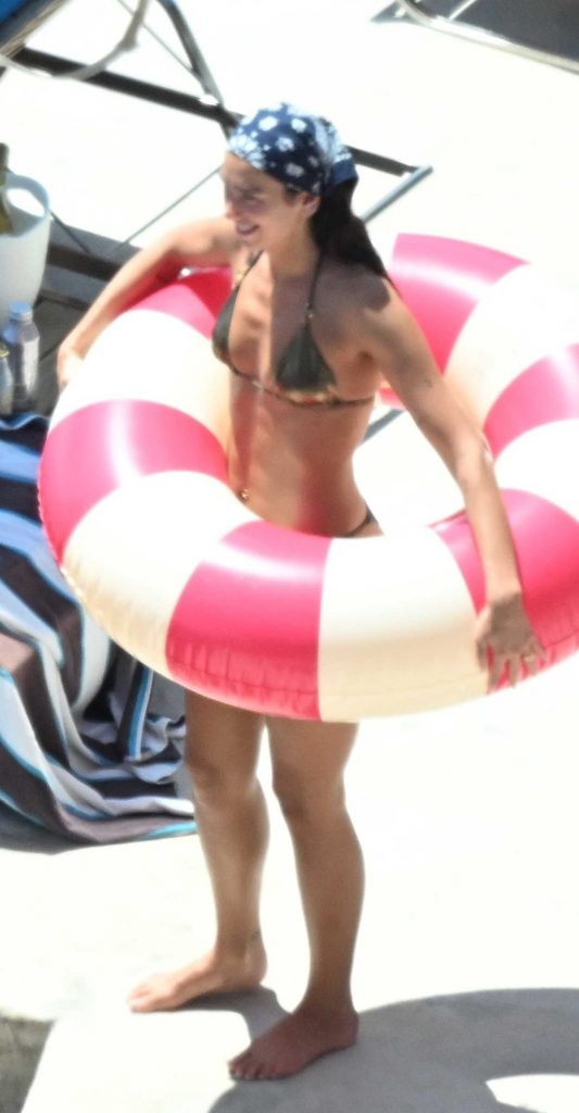 Dua Lipa in a Gold Bikini