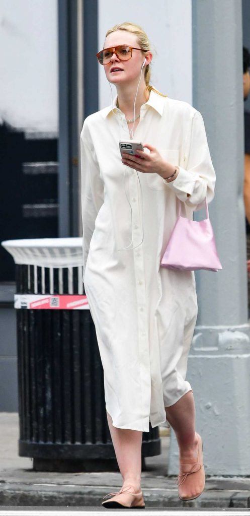 Elle Fanning in a White Shirt Dress