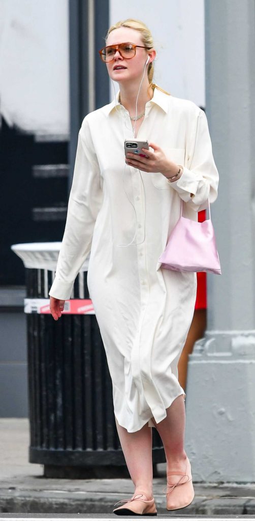 Elle Fanning in a White Shirt Dress