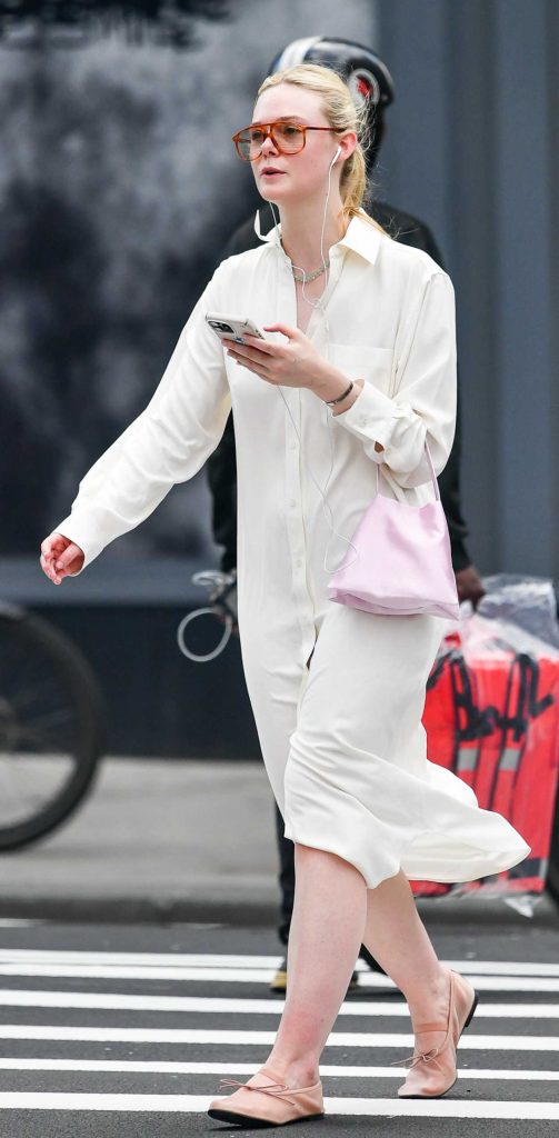 Elle Fanning in a White Shirt Dress
