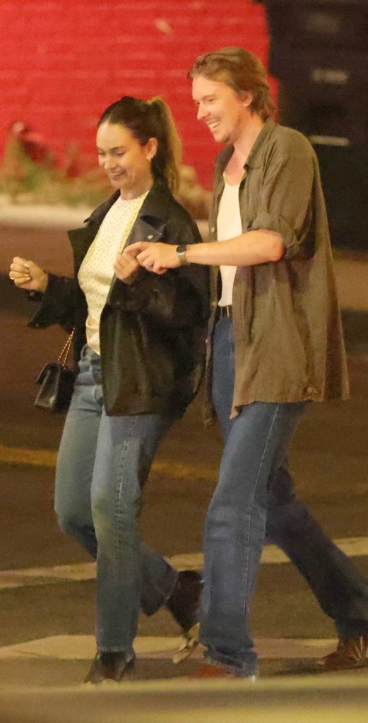 Lily James in a Black Leather Jacket