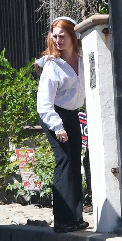 Madelaine Petsch in a Black Pants