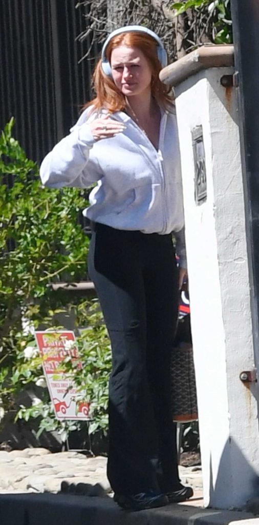 Madelaine Petsch in a Black Pants