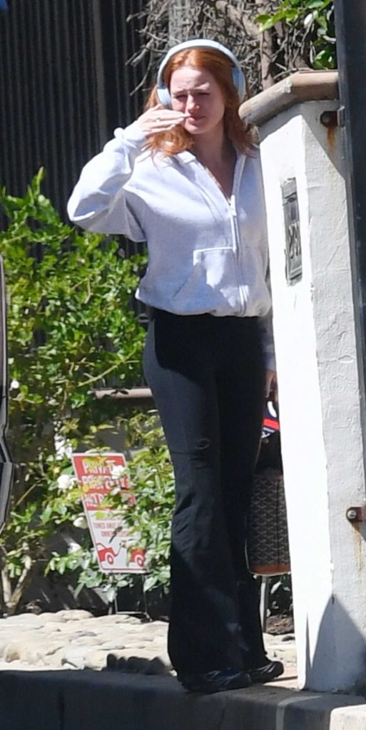 Madelaine Petsch in a Black Pants