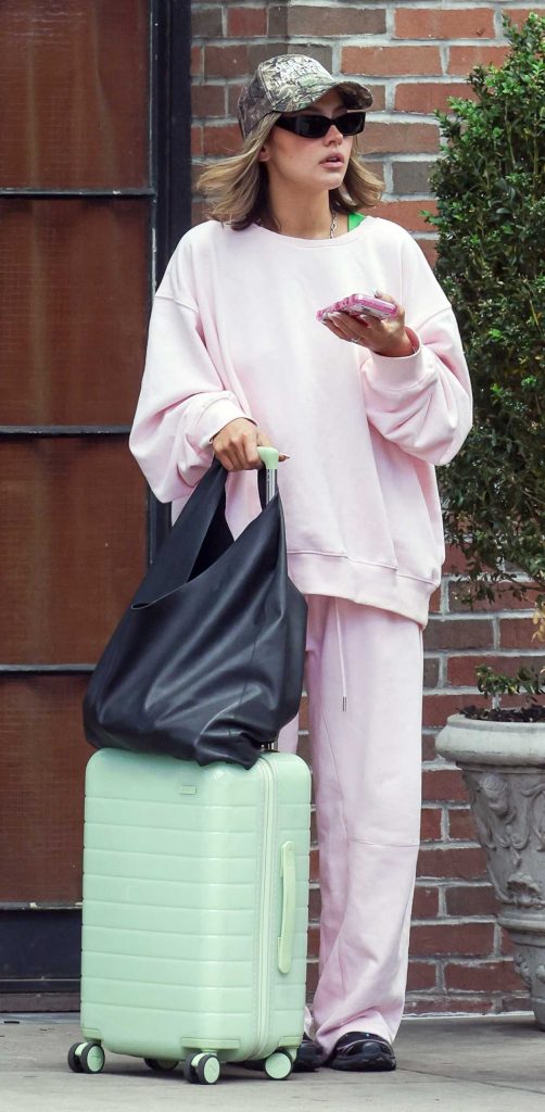 Madelyn Cline in a Pink Sweatsuit