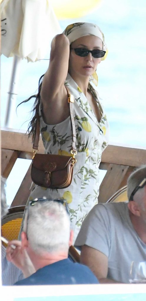Nina Dobrev in a White Floral Dress