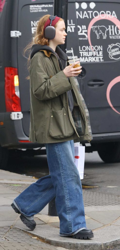 Sadie Sink in an Olive Jacket