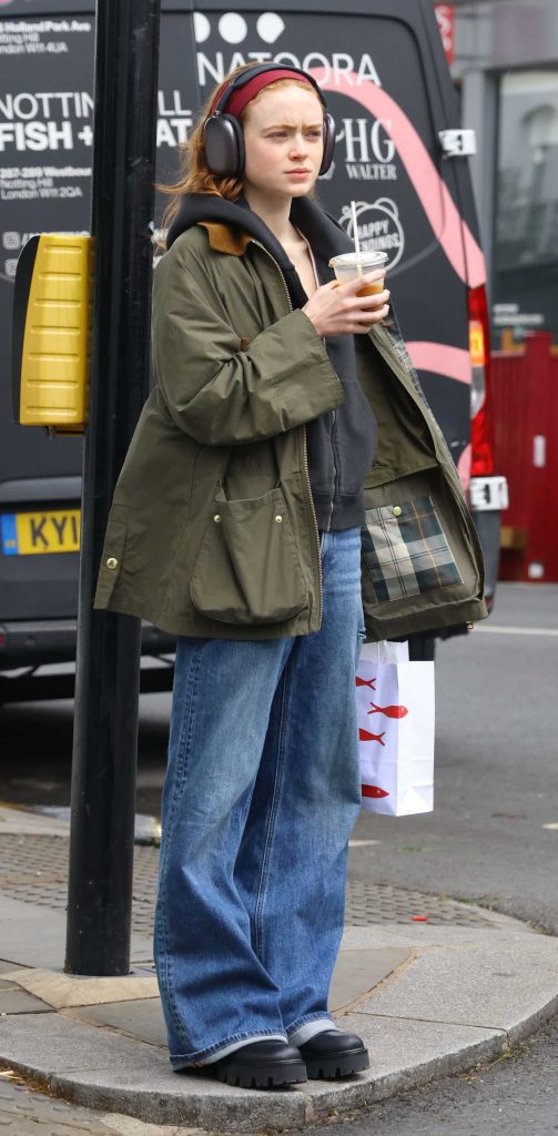 Sadie Sink in an Olive Jacket