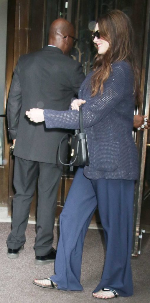 Anne Hathaway in a Blue Pants