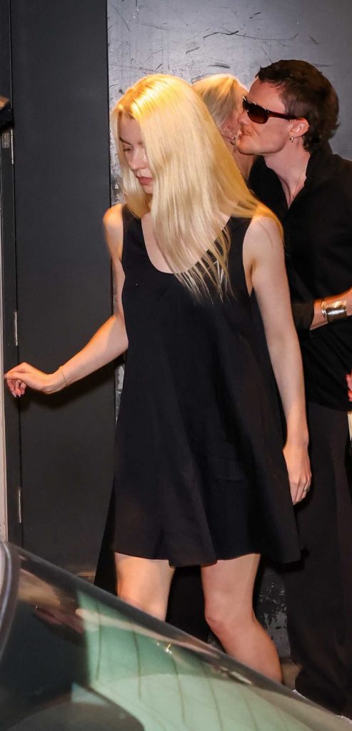 Anya Taylor-Joy in a Black Dress