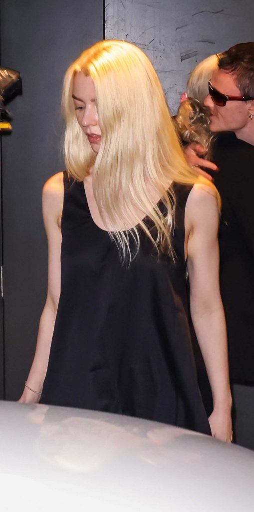 Anya Taylor-Joy in a Black Dress