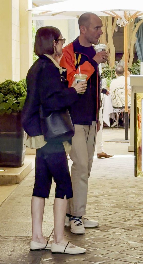 Lily Collins in a Black Jacket